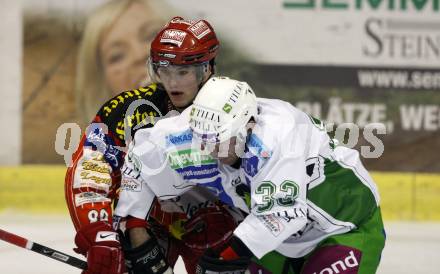 EBEL. Eishockey Bundesliga. KAC gegen HDD TILIA Olimpija Ljubljana.  Raphael Herburger, (KAC),  Ivo Jan (Ljubljana). Klagenfurt, am 27.10.2009.
Foto: Kuess 

---
pressefotos, pressefotografie, kuess, qs, qspictures, sport, bild, bilder, bilddatenbank