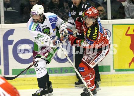 EBEL. Eishockey Bundesliga. KAC gegen HDD TILIA Olimpija Ljubljana.  Thomas Hundertpfund, (KAC), Travis Brigley (Ljubljana). Klagenfurt, am 27.10.2009.
Foto: Kuess 

---
pressefotos, pressefotografie, kuess, qs, qspictures, sport, bild, bilder, bilddatenbank