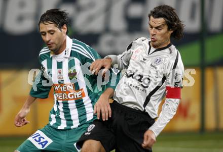 Fussball. Tipp3-Bundesliga. SK Austria Kelag Kaernten gegen Rapid Wien.  Jocelyn Blanchard, (Austria Kaernten), Branko Boskovic (Rapid). Klagenfurt, 28.10.2009.
Foto: Kuess  

---
pressefotos, pressefotografie, kuess, qs, qspictures, sport, bild, bilder, bilddatenbank