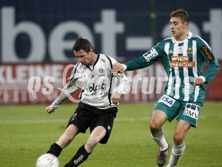 Fussball. Tipp3-Bundesliga. SK Austria Kelag Kaernten gegen Rapid Wien.  Martin Hiden, (Austria Kaernten), Nikica Jelavic (Rapid). Klagenfurt, 28.10.2009.
Foto: Kuess  

---
pressefotos, pressefotografie, kuess, qs, qspictures, sport, bild, bilder, bilddatenbank