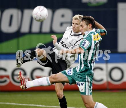 Fussball. Tipp3-Bundesliga. SK Austria Kelag Kaernten gegen Rapid Wien.  Thomas Hinum, (Austria Kaernten), Veli Kavlak (Rapid). Klagenfurt, 28.10.2009.
Foto: Kuess  

---
pressefotos, pressefotografie, kuess, qs, qspictures, sport, bild, bilder, bilddatenbank