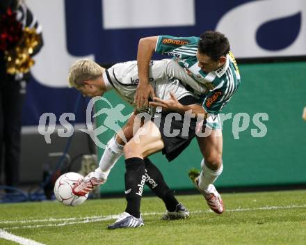 Fussball. Tipp3-Bundesliga. SK Austria Kelag Kaernten gegen Rapid Wien.  Thomas Hinum, (Austria Kaernten), Veli Kavlak (Rapid). Klagenfurt, 28.10.2009.
Foto: Kuess  

---
pressefotos, pressefotografie, kuess, qs, qspictures, sport, bild, bilder, bilddatenbank