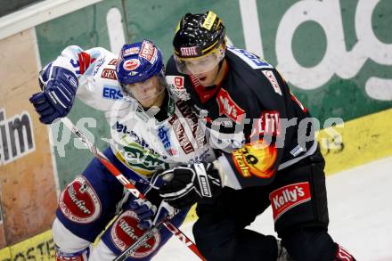 EBEL. Eishockey Bundesliga. EC Pasut VSV gegen Vienna Capitals.  Andreas Kristler, (VSV),  Ales Kranjc (Caps). Villach, am 30.10.2009.
Foto: Kuess 


---
pressefotos, pressefotografie, kuess, qs, qspictures, sport, bild, bilder, bilddatenbank