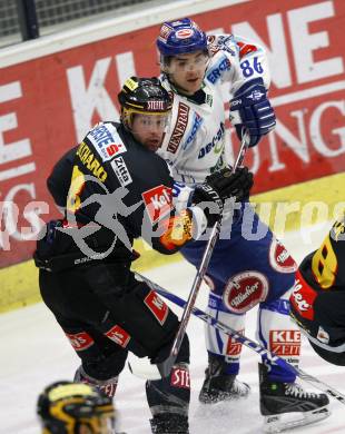 EBEL. Eishockey Bundesliga. EC Pasut VSV gegen Vienna Capitals.  Jonathan Ferland, (VSV), Francois Bouchard (Caps). Villach, am 30.10.2009.
Foto: Kuess 


---
pressefotos, pressefotografie, kuess, qs, qspictures, sport, bild, bilder, bilddatenbank