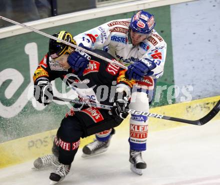 EBEL. Eishockey Bundesliga. EC Pasut VSV gegen Vienna Capitals.  Benjamin Petrik, (VSV), Ales Kranjc (Caps). Villach, am 30.10.2009.
Foto: Kuess 


---
pressefotos, pressefotografie, kuess, qs, qspictures, sport, bild, bilder, bilddatenbank