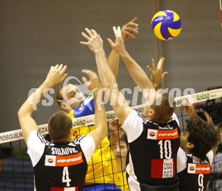 Volleyball. MEVZA. SK Aich/Dob gegen Hotvolleys Wien. Martin BENCIC (Aich), Milos STOJKOVIC, Richard NEMEC, Guilherme SANTOS (Hotvolleys). Prevalje, 7.11.2009.
Foto:Kuess

---
pressefotos, pressefotografie, kuess, qs, qspictures, sport, bild, bilder, bilddatenbank