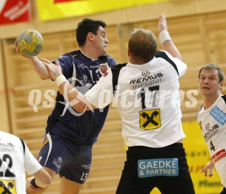 Handball Bundesliga. SC Ferlach gegen HSG Baernbach/Koeflach. Bostjan Stusaj (Ferlach), Manfred Messner (Baernbach). Ferlach, 7.11.2009.
Foto: Kuess

---
pressefotos, pressefotografie, kuess, qs, qspictures, sport, bild, bilder, bilddatenbank