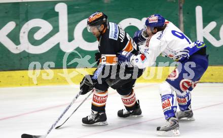 EBEL. Eishockey Bundesliga. EC Pasut VSV gegen Graz 99ers. Christian Ban (VSV), Rodney Jarrett (Graz). Villach, am 17.11.2009.
Foto: Kuess 


---
pressefotos, pressefotografie, kuess, qs, qspictures, sport, bild, bilder, bilddatenbank