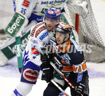 EBEL. Eishockey Bundesliga. EC Pasut VSV gegen Graz 99ers. Mickey Elick Harry Lange (VSV), (Graz). Villach, am 17.11.2009.
Foto: Kuess 


---
pressefotos, pressefotografie, kuess, qs, qspictures, sport, bild, bilder, bilddatenbank