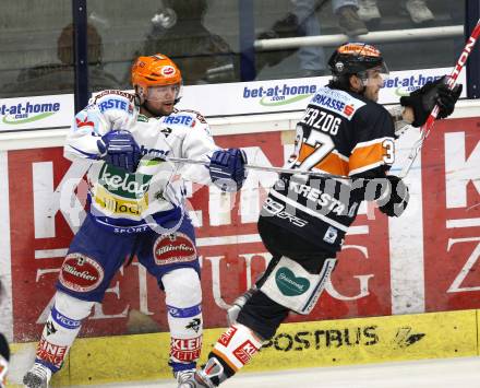 EBEL. Eishockey Bundesliga. EC Pasut VSV gegen Graz 99ers. Roland Kaspitz (VSV), Stefan Herzog (Graz). Villach, am 17.11.2009.
Foto: Kuess 


---
pressefotos, pressefotografie, kuess, qs, qspictures, sport, bild, bilder, bilddatenbank