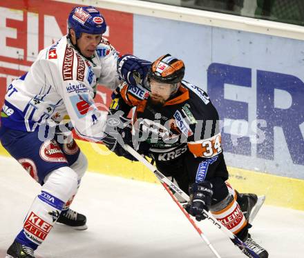 EBEL. Eishockey Bundesliga. EC Pasut VSV gegen Graz 99ers. Mike Stewart (VSV), Markus Peintner (Graz). Villach, am 17.11.2009.
Foto: Kuess 


---
pressefotos, pressefotografie, kuess, qs, qspictures, sport, bild, bilder, bilddatenbank