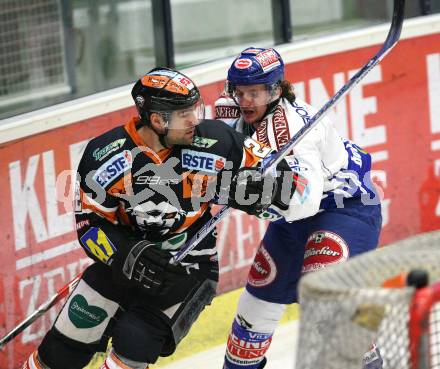 EBEL. Eishockey Bundesliga. EC Pasut VSV gegen Graz 99ers. Christian Ban (VSV), Rodney Jarrett (Graz). Villach, am 17.11.2009.
Foto: Kuess 


---
pressefotos, pressefotografie, kuess, qs, qspictures, sport, bild, bilder, bilddatenbank