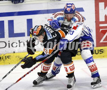 EBEL. Eishockey Bundesliga. EC Pasut VSV gegen Graz 99ers. Mikael Wahlberg (VSV), Christoph Harand (Graz). Villach, am 17.11.2009.
Foto: Kuess 


---
pressefotos, pressefotografie, kuess, qs, qspictures, sport, bild, bilder, bilddatenbank