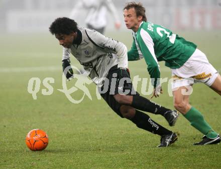 Fussball. Tipp3-Bundesliga. SK Austria Kelag Kaernten gegen SV Mattersburg. Sandro, (Austria Kaernten),  Roland Spuller (Mattersburg). Klagenfurt, 21.11.2009. 
Foto: Kuess

---
pressefotos, pressefotografie, kuess, qs, qspictures, sport, bild, bilder, bilddatenbank