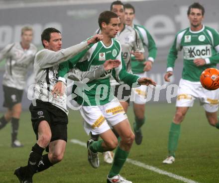 Fussball. Tipp3-Bundesliga. SK Austria Kelag Kaernten gegen SV Mattersburg. Martin Hiden,(Austria Kaernten),  Alexander Poellhuber (Mattersburg). Klagenfurt, 21.11.2009. 
Foto: Kuess

---
pressefotos, pressefotografie, kuess, qs, qspictures, sport, bild, bilder, bilddatenbank