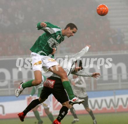 Fussball. Tipp3-Bundesliga. SK Austria Kelag Kaernten gegen SV Mattersburg. Wolfgang Mair, (Austria Kaernten), Alexander Poellhuber (Mattersburg). Klagenfurt, 21.11.2009. 
Foto: Kuess

---
pressefotos, pressefotografie, kuess, qs, qspictures, sport, bild, bilder, bilddatenbank