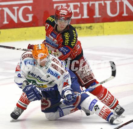 EBEL. Eishockey Bundesliga.  VSV gegen KAC. Roland Kaspitz, (VSV), Thomas Hundertpfund (KAC). Villach, am 8.12.2009.
Foto: Kuess 


---
pressefotos, pressefotografie, kuess, qs, qspictures, sport, bild, bilder, bilddatenbank