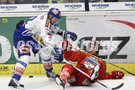 EBEL. Eishockey Bundesliga.  VSV gegen KAC. Thomas Pfeffer, (VSV), Gregor Hager (KAC). Villach, am 8.12.2009.
Foto: Kuess 


---
pressefotos, pressefotografie, kuess, qs, qspictures, sport, bild, bilder, bilddatenbank