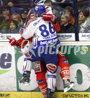 EBEL. Eishockey Bundesliga.  VSV gegen KAC. Jonathan Ferland, (VSV), David Schuller (KAC). Villach, am 8.12.2009.
Foto: Kuess 


---
pressefotos, pressefotografie, kuess, qs, qspictures, sport, bild, bilder, bilddatenbank