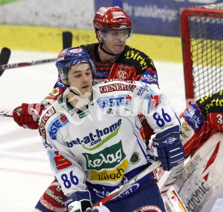 EBEL. Eishockey Bundesliga.  VSV gegen KAC. Jonathan Ferland, (VSV), Kirk Furey (KAC). Villach, am 8.12.2009.
Foto: Kuess 


---
pressefotos, pressefotografie, kuess, qs, qspictures, sport, bild, bilder, bilddatenbank