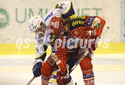 EBEL. Eishockey Bundesliga. EC KAC gegen KHLMedvescak Zagreb. Paul Schellander (KAC), Mike Ouellette (Zagreb). Klagenfurt, am 11.12.2009.
Foto: Kuess
---
pressefotos, pressefotografie, kuess, qs, qspictures, sport, bild, bilder, bilddatenbank