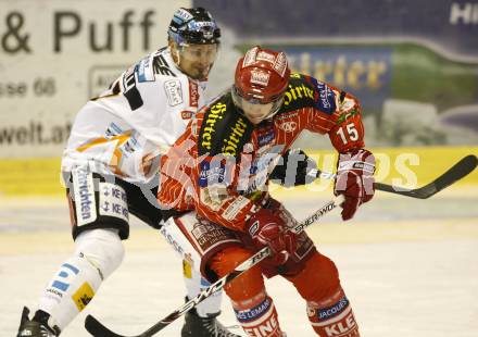 EBEL. Eishockey Bundesliga. KAC gegen EHC LIWEST Linz. Paul Schellander,  (KAC), Rich Bronilla (Linz). Klagenfurt, am 20.12.2009.
Foto: Kuess 

---
pressefotos, pressefotografie, kuess, qs, qspictures, sport, bild, bilder, bilddatenbank