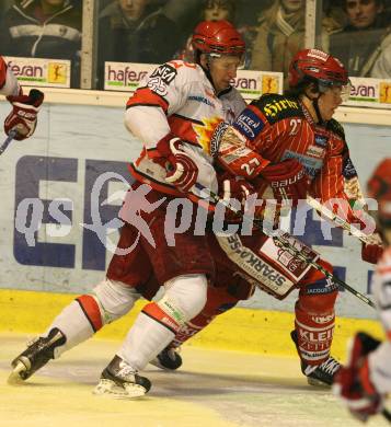 EBEL. Eishockey Bundesliga. KAC gegen HK Acroni Jesenice.  Thomas Hundertpfund (KAC),  Robert Sabolic (Jesenice). Klagenfurt, am 22.12.2009.
Foto: Kuess 

---
pressefotos, pressefotografie, kuess, qs, qspictures, sport, bild, bilder, bilddatenbank