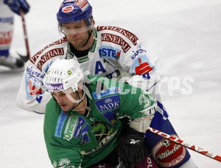 EBEL. Eishockey Bundesliga. EC Pasut VSV gegen HDD TILIA Olimpija Ljubljana, Laibach.  Mickey Elick, (VSV), Frank Banham (Ljubljana). Villach, am 29.12.2008.
Foto: Kuess 


---
pressefotos, pressefotografie, kuess, qs, qspictures, sport, bild, bilder, bilddatenbank