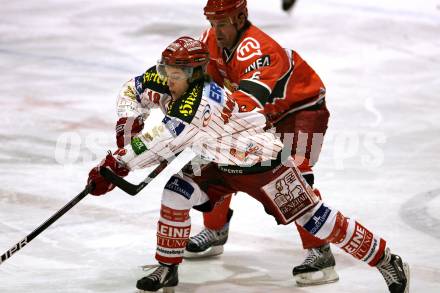 EBEL. Eishockey Bundesliga. HK Acroni Jesenice  gegen KAC.    Jakobitsch Silvio  (KAC), ELIK Todd  (Jesenice). Jesenice, am 29.12.2009.
Foto: Kuess 

---
pressefotos, pressefotografie, kuess, qs, qspictures, sport, bild, bilder, bilddatenbank