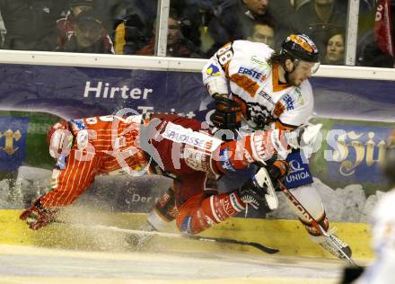 EBEL. Eishockey Bundesliga. KAC gegen  Graz 99ers. Mike Craig, (KAC), Mark Brunnegger (Graz). Klagenfurt, am 1.1.2010.
Foto: Kuess 

---
pressefotos, pressefotografie, kuess, qs, qspictures, sport, bild, bilder, bilddatenbank