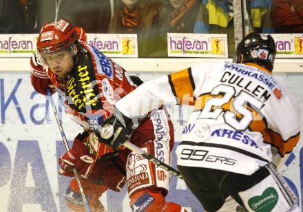 EBEL. Eishockey Bundesliga. KAC gegen  Graz 99ers.  Jason Morgan (KAC),  David Cullen (Graz). Klagenfurt, am 1.1.2010.
Foto: Kuess 

---
pressefotos, pressefotografie, kuess, qs, qspictures, sport, bild, bilder, bilddatenbank