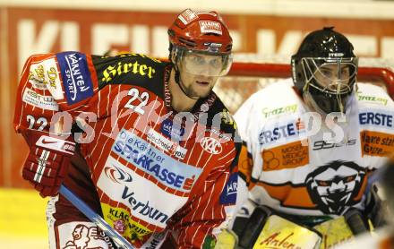 EBEL. Eishockey Bundesliga. KAC gegen  Graz 99ers.  Jason Morgan (KAC),  Fabian Weinhandl (Graz). Klagenfurt, am 1.1.2010.
Foto: Kuess 

---
pressefotos, pressefotografie, kuess, qs, qspictures, sport, bild, bilder, bilddatenbank