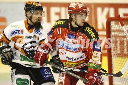 EBEL. Eishockey Bundesliga. KAC gegen  Graz 99ers.  Johannes Reichel (KAC),  Markus Peintner (Graz). Klagenfurt, am 1.1.2010.
Foto: Kuess 

---
pressefotos, pressefotografie, kuess, qs, qspictures, sport, bild, bilder, bilddatenbank