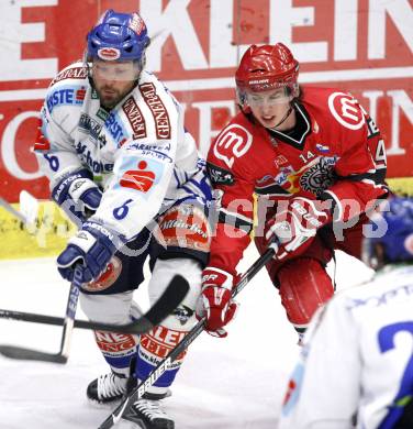 EBEL. Eishockey Bundesliga. EC Pasut VSV gegen HK Acroni Jesenice.  Gerhard Unterluggauer, (VSV),  Ziga Jeglic (Jesenice). Villach, am 3.1.2010.
Foto: Kuess 


---
pressefotos, pressefotografie, kuess, qs, qspictures, sport, bild, bilder, bilddatenbank