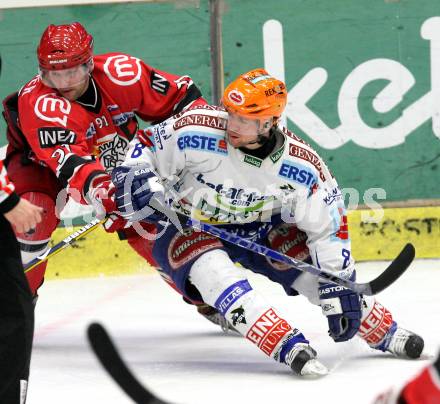 EBEL. Eishockey Bundesliga. EC Pasut VSV gegen HK Acroni Jesenice.  Roland Kaspitz, (VSV), Tomo Hafner (Jesenice). Villach, am 3.1.2010.
Foto: Kuess 


---
pressefotos, pressefotografie, kuess, qs, qspictures, sport, bild, bilder, bilddatenbank