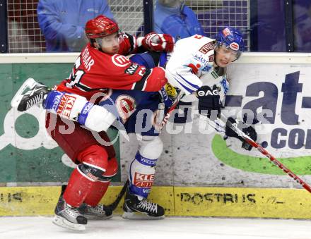 EBEL. Eishockey Bundesliga. EC Pasut VSV gegen HK Acroni Jesenice.  Michael Raffl, (VSV), Mitja Robar (Jesenice). Villach, am 3.1.2010.
Foto: Kuess 


---
pressefotos, pressefotografie, kuess, qs, qspictures, sport, bild, bilder, bilddatenbank