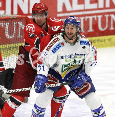 EBEL. Eishockey Bundesliga. EC Pasut VSV gegen HK Acroni Jesenice.  Kiel McLeod (VSV), Jan Golubovski (Jesenice). Villach, am 3.1.2010.
Foto: Kuess 


---
pressefotos, pressefotografie, kuess, qs, qspictures, sport, bild, bilder, bilddatenbank