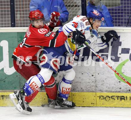 EBEL. Eishockey Bundesliga. EC Pasut VSV gegen HK Acroni Jesenice.  Michael Raffl (VSV), Mitja Robar (Jesenice). Villach, am 3.1.2010.
Foto: Kuess 


---
pressefotos, pressefotografie, kuess, qs, qspictures, sport, bild, bilder, bilddatenbank