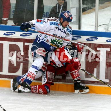 EBEL. Eishockey Bundesliga. Freiluftderby KAC gegen VSV in der Hypo Group Arena. GEIER Manuel (KAC), STEWART Michael (VSV). Klagenfurt, am 9.1.2010.
Foto: Kuess

---
pressefotos, pressefotografie, kuess, qs, qspictures, sport, bild, bilder, bilddatenbank
