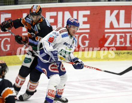 EBEL. Eishockey Bundesliga. EC Pasut VSV gegen Graz 99ers. Robert Natha Di Casmirro, (VSV), Martin Oraze  (Graz). Villach, am 15.1.2010.
Foto: Kuess 


---
pressefotos, pressefotografie, kuess, qs, qspictures, sport, bild, bilder, bilddatenbank