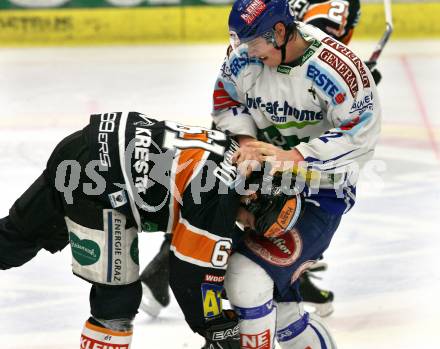 EBEL. Eishockey Bundesliga. EC Pasut VSV gegen Graz 99ers. Michael Raffl, (VSV), Christoph Harand  (Graz). Villach, am 15.1.2010.
Foto: Kuess 


---
pressefotos, pressefotografie, kuess, qs, qspictures, sport, bild, bilder, bilddatenbank