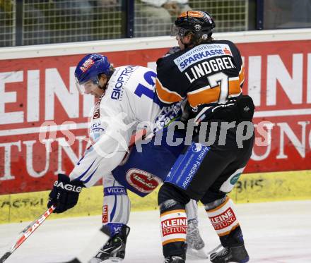 EBEL. Eishockey Bundesliga. EC Pasut VSV gegen Graz 99ers. Michael Raffl,  (VSV),Victor Lindgren (Graz). Villach, am 15.1.2010.
Foto: Kuess 


---
pressefotos, pressefotografie, kuess, qs, qspictures, sport, bild, bilder, bilddatenbank