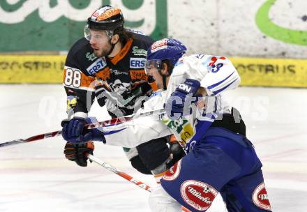 EBEL. Eishockey Bundesliga. EC Pasut VSV gegen Graz 99ers. Benjamin Petrik,  (VSV), Mark Brunnegger (Graz). Villach, am 15.1.2010.
Foto: Kuess 


---
pressefotos, pressefotografie, kuess, qs, qspictures, sport, bild, bilder, bilddatenbank