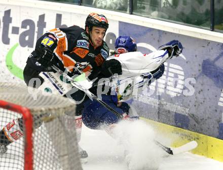 EBEL. Eishockey Bundesliga. EC Pasut VSV gegen Graz 99ers. Nico Toff,  (VSV), Warren Norris (Graz). Villach, am 15.1.2010.
Foto: Kuess 


---
pressefotos, pressefotografie, kuess, qs, qspictures, sport, bild, bilder, bilddatenbank