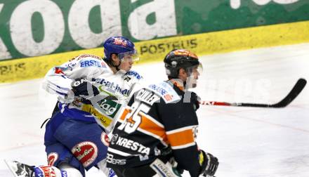 EBEL. Eishockey Bundesliga. EC Pasut VSV gegen Graz 99ers.  Michael Raffl, (VSV), David Cullen (Graz). Villach, am 15.1.2010.
Foto: Kuess 


---
pressefotos, pressefotografie, kuess, qs, qspictures, sport, bild, bilder, bilddatenbank