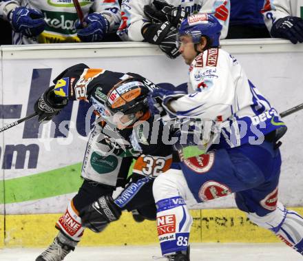 EBEL. Eishockey Bundesliga. EC Pasut VSV gegen Graz 99ers. Philipp Pinter,  (VSV), Jean Philippe Pare (Graz). Villach, am 15.1.2010.
Foto: Kuess 


---
pressefotos, pressefotografie, kuess, qs, qspictures, sport, bild, bilder, bilddatenbank