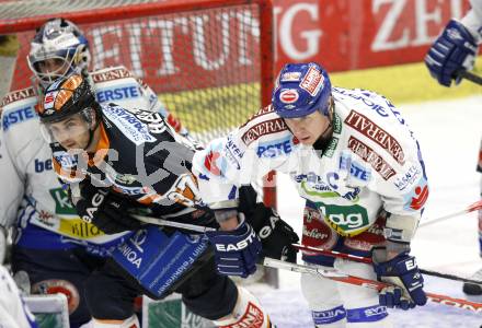 EBEL. Eishockey Bundesliga. EC Pasut VSV gegen Graz 99ers. Mike Stewart,  (VSV), Stefan Herzog (Graz). Villach, am 15.1.2010.
Foto: Kuess 


---
pressefotos, pressefotografie, kuess, qs, qspictures, sport, bild, bilder, bilddatenbank