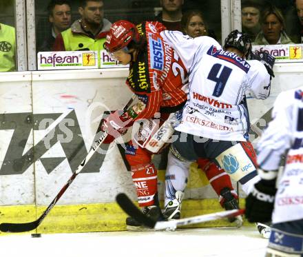 EBEL. Eishockey Bundesliga. KAC gegen Alba Volan SAPA Fehervar. HUNDERTPFUND Thomas (KAC), HORVATH Andras (Alba Volan). Klagenfurt, am 17.1.2010.
Foto: Kuess

---
pressefotos, pressefotografie, kuess, qs, qspictures, sport, bild, bilder, bilddatenbank
