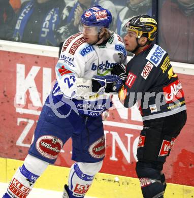 EBEL. Eishockey Bundesliga. EC Pasut VSV gegen EV Vienna Capitals.  Thomas Pfeffer, (VSV), Rafael Rotter (Vienna). Villach, am 17.1.2010.
Foto: Kuess 


---
pressefotos, pressefotografie, kuess, qs, qspictures, sport, bild, bilder, bilddatenbank