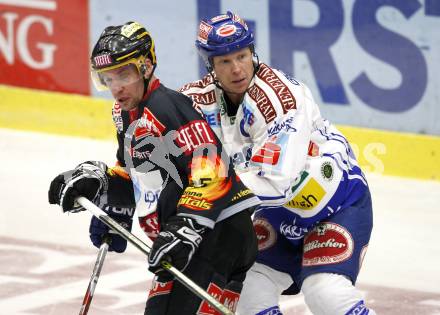 EBEL. Eishockey Bundesliga. EC Pasut VSV gegen EV Vienna Capitals.  Mike Stewart, (VSV), Benoit Gratton (Vienna). Villach, am 17.1.2010.
Foto: Kuess 


---
pressefotos, pressefotografie, kuess, qs, qspictures, sport, bild, bilder, bilddatenbank